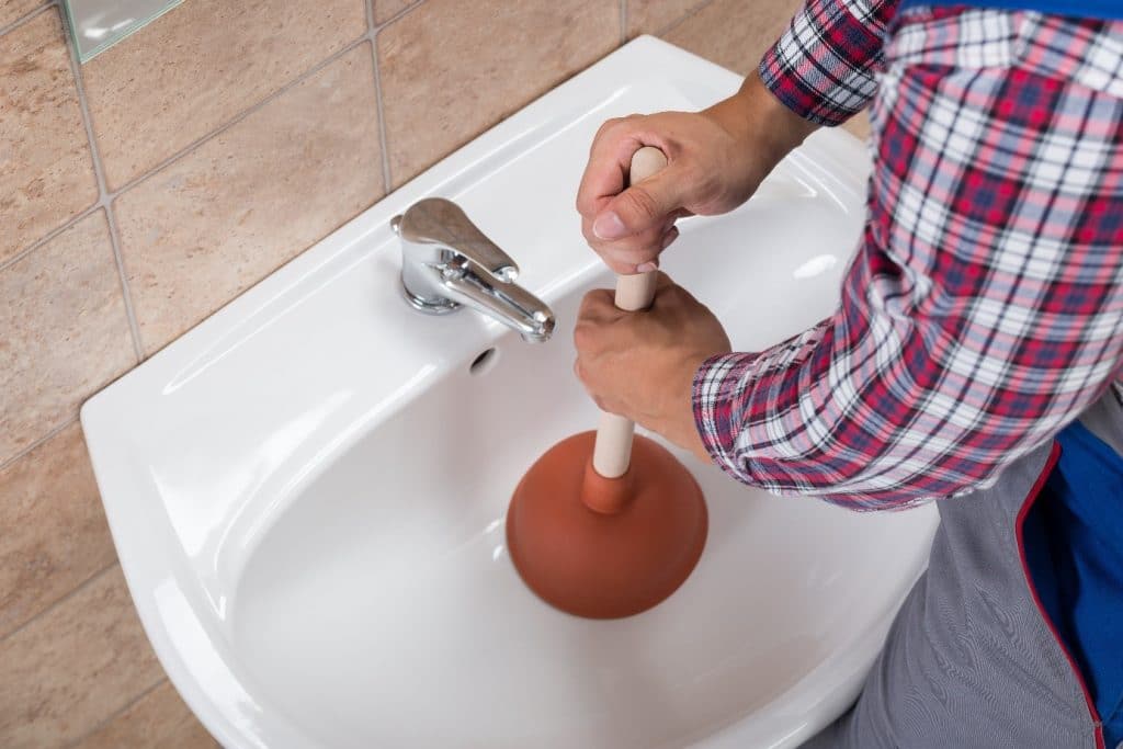 unclogging bathroom sink naturally with lime